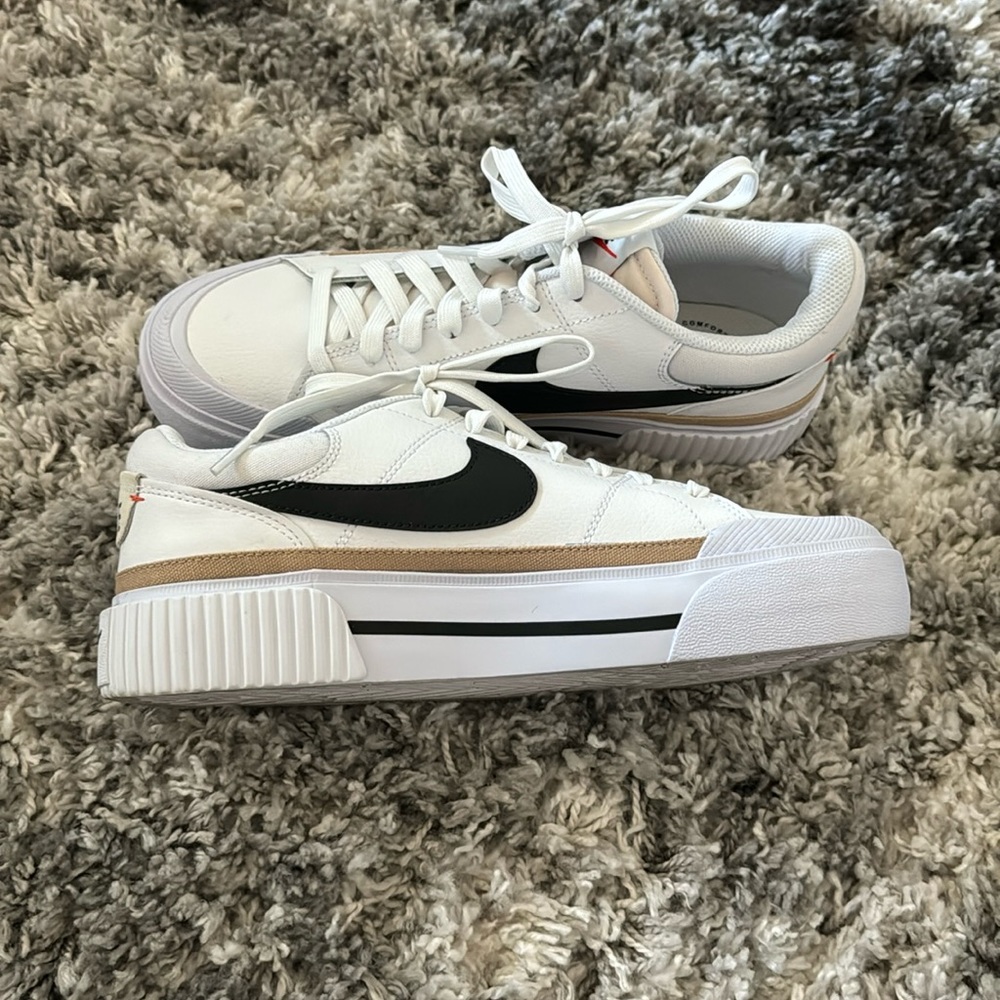 Brand new size 9 Nike women’s court legacy platform sneakers. New in box.